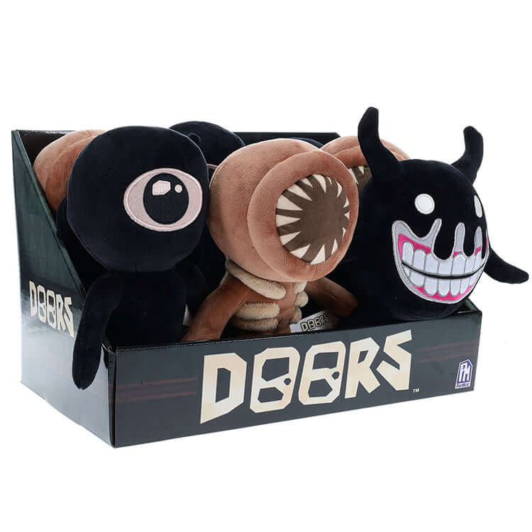 Collectable plush toys from Doors Series 1 featuring Screech, Figure, and Seek in a display box.