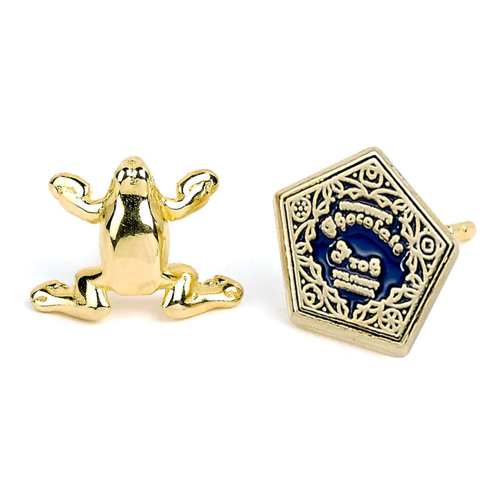 Official Harry Potter stud earring set featuring gold Chocolate Frog and decorative design.