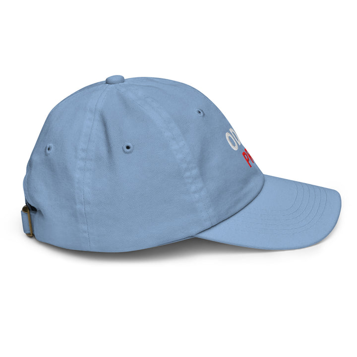 Oddy Pro Youth baseball cap in blue with adjustable strap and breathable eyelets.