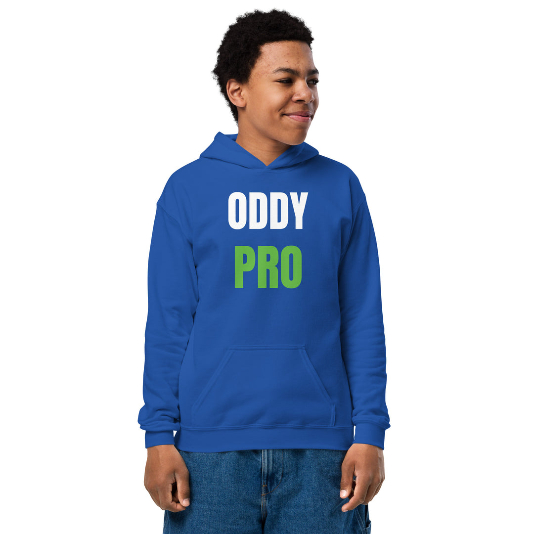 Oddy Pro Youth heavy blend hoodie in blue worn by a smiling child with a front pouch pocket.